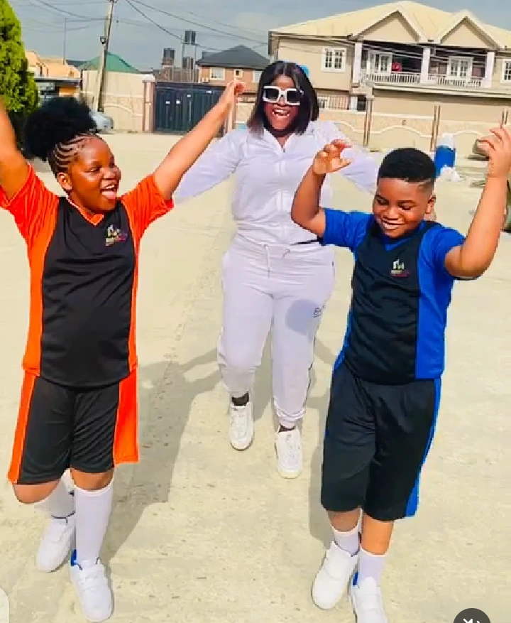 Reactions As Bukola Arugba Steps Out With Her Twins To Their School Inter-House Sport