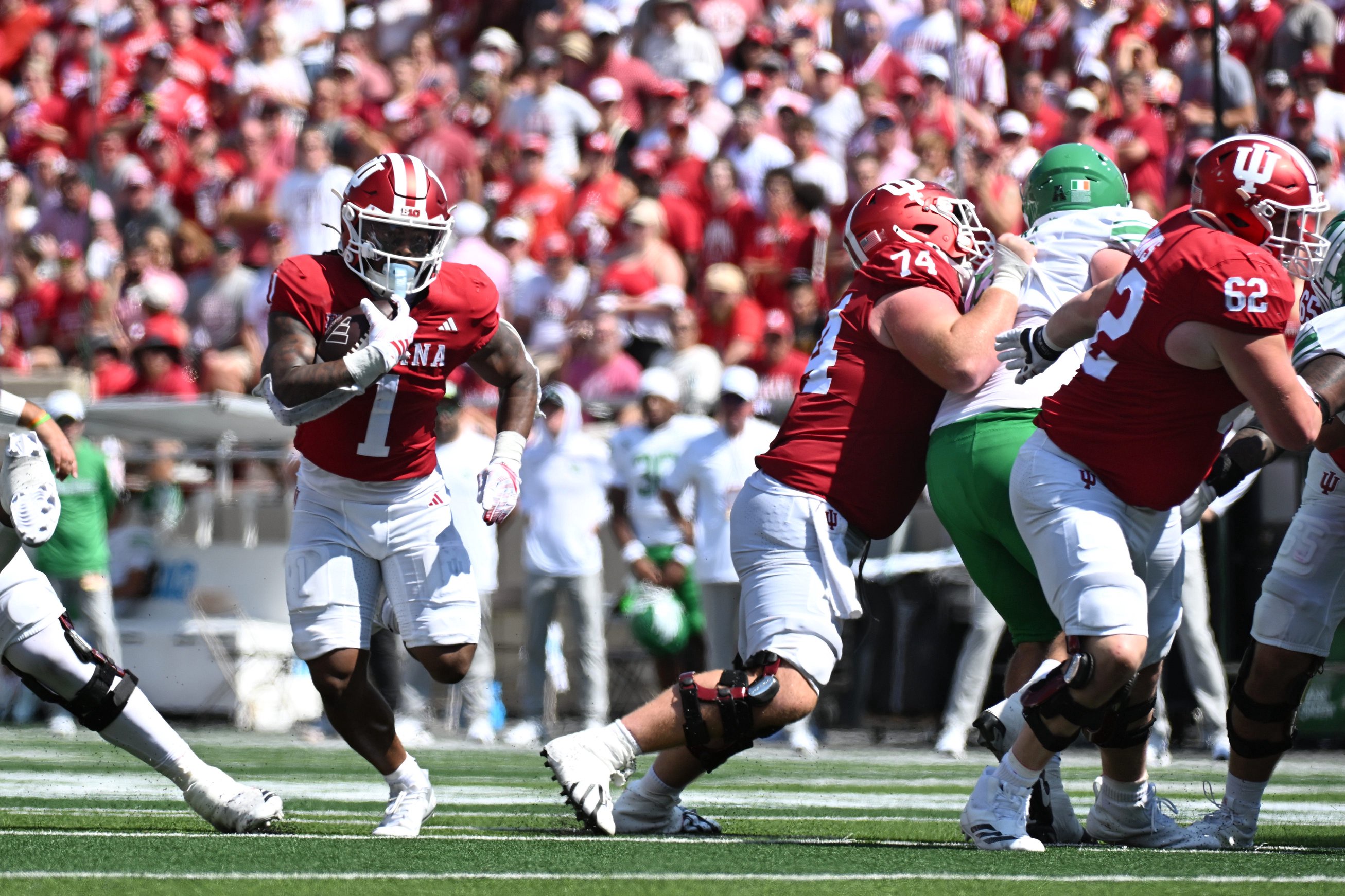 Sep 5, 2026; Bloomington, Indiana, USA;  Indiana Hoosiers running back Turbo Richard (1) carries the ball against the North Texas Mean Green during the first quarter at Merchants Bank Field at Memorial Stadium.  Mandatory Credit: Robert Goddin-Imagn Images