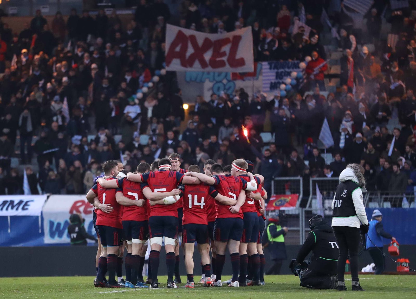 Munster players get into a huddle in front of tributes to Anthony Foley in the stand before a match away to Racing 92 in January 2017. Photograph: Billy Stickland/Inpho