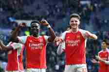 Bukayo Saka and Declan Rice of Arsenal celebrate after the team's victory during the Premier League match between Tottenham Hotspur and Arsenal FC ...