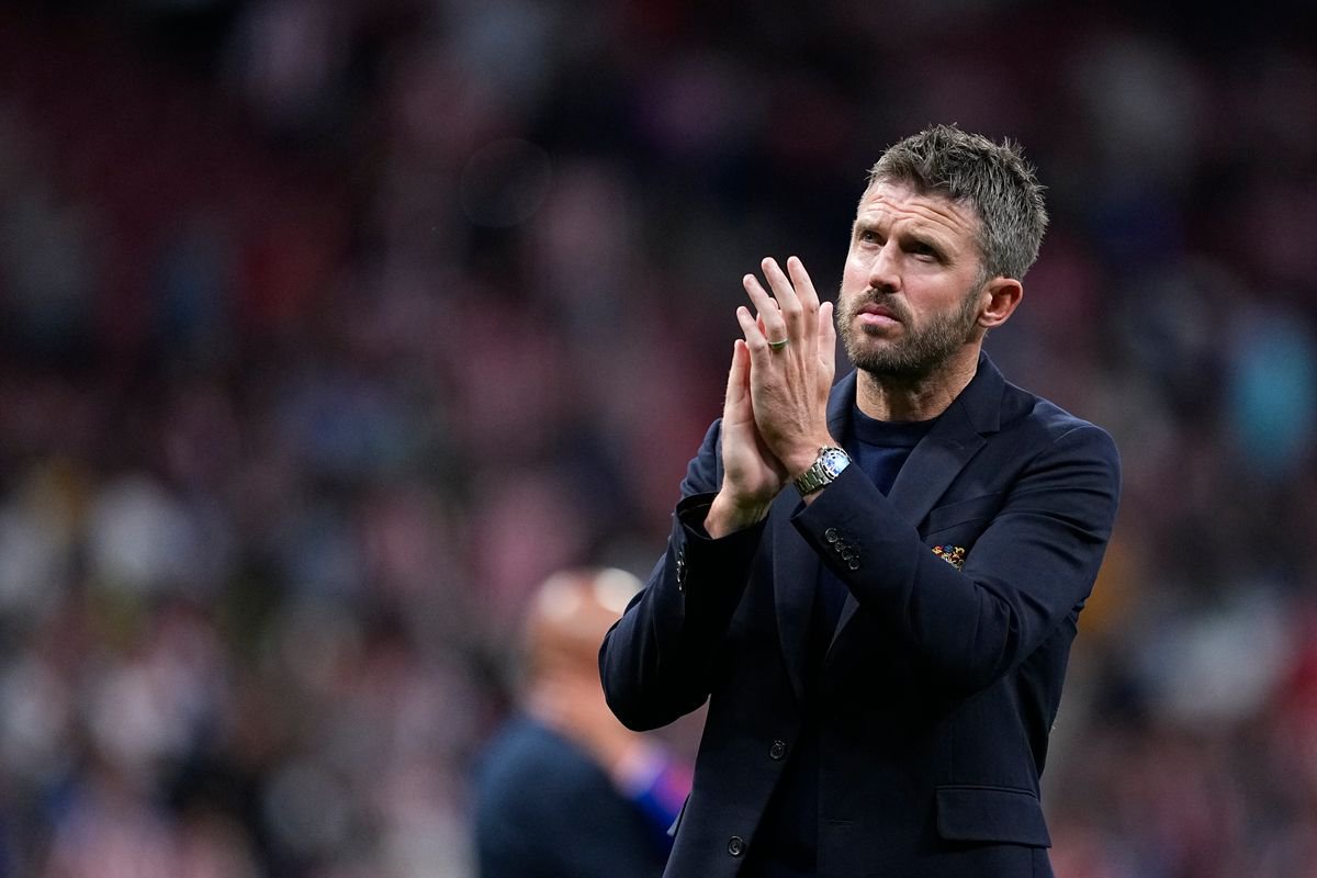 Michael Carrick, head coach of Manchester United, greets the supporters during the UEFA Champions League 2026/27 League Phase MD2 match between Atletico de Madrid and Manchester United