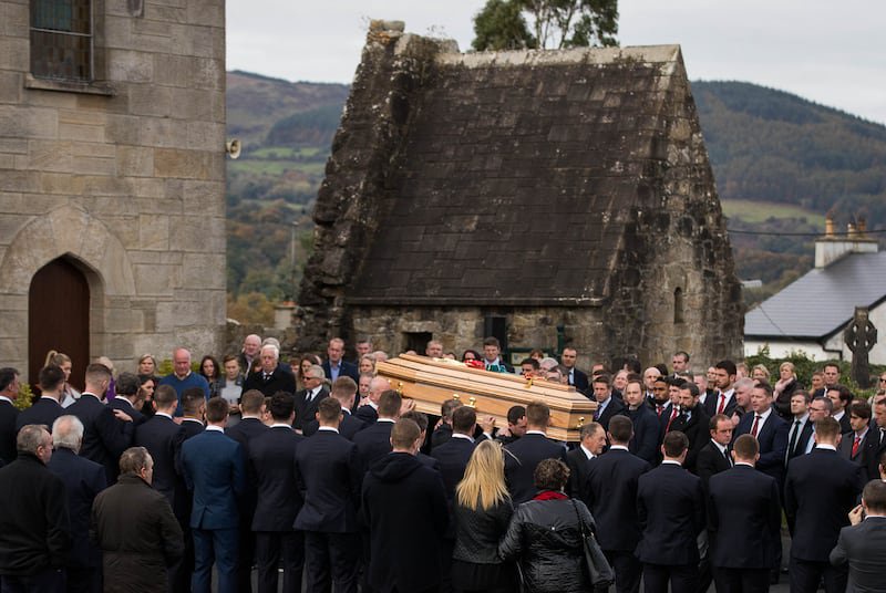 The coffin is carried from St Flannan’s Church in Killaloe, Co Clare, after Anthony Foley's funeral in October 2016. Photograph: Ryan Byrne/Inpho