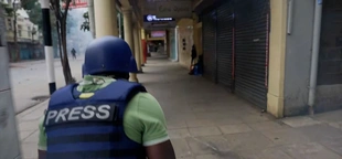 Video shows CNN correspondent get tear gassed during Kenya protests