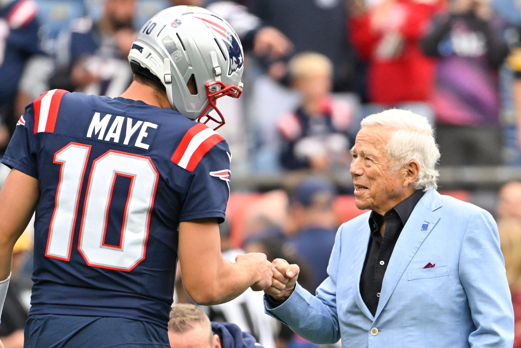September 20, 2026; Foxborough, Massachusetts, USA; New England Patriots quarterback Drake Maye (10) first bumps owner Robert Kraft before a game against the Pittsburgh Steelers at Gillette Stadium. Mandatory Credit: Eric Canha-Imagn Images