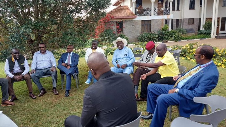 May be an image of 8 people, people standing, people sitting and outdoors