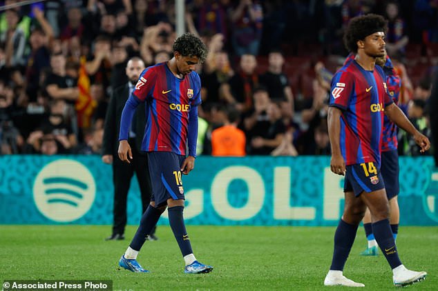 Barcelona's Lamine Yamal reacts at the end of the Spanish La Liga soccer match between FC Barcelona and Real Madrid in Barcelona, Spain, Sunday, Oct. 25, 2026. (AP Photo/Joan Monfort)