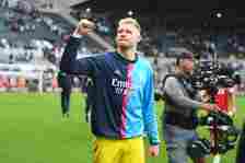 Aaron Ramsdale of Arsenal celebrates victory following the Premier League match between Newcastle United and Arsenal FC at St. James Park on May 07...