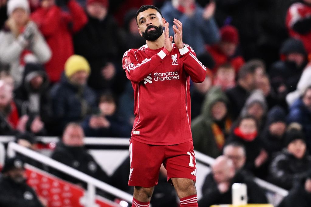 LIVERPOOL, ENGLAND - FEBRUARY 14: THE SUN OUT, THE SUN ON SUNDAY OUT Mohamed Salah of Liverpool applauds the fans as he is substituted off for teammate Rio Ngumoha (not pictured) during the Emirates FA Cup Fourth Round match between Liverpool and Brighton & Hove Albion at Anfield on February 14, 2026 in Liverpool, England. (Photo by Liverpool FC/Liverpool FC via Getty Images)
