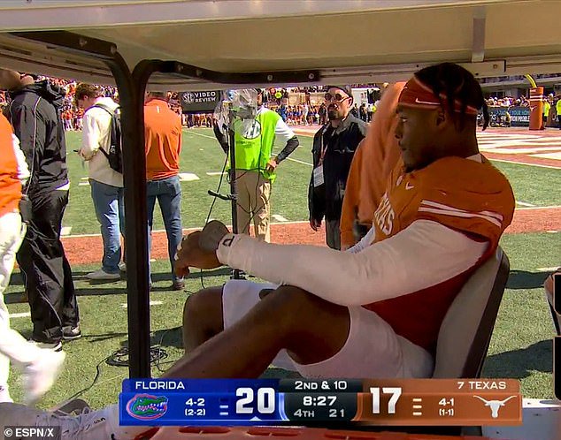 Texas star Colin Simmons had to be carted off the field after suffering a worrying injury
