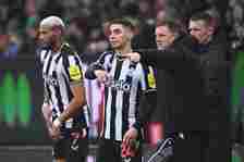 Joelinton and Miguel Almiron of Newcastle United are substituted on during the Premier League match between Burnley FC and Newcastle United at Turf...