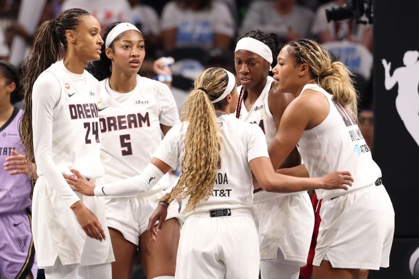 Atlanta Dream players huddle during the first quarter in Game 4 of the WNBA Finals on Saturday.