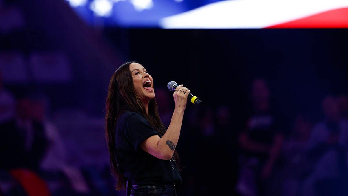 Alanis Morissette signs the national anthem before Game 2 of the WNBA Finals at Chase Center.