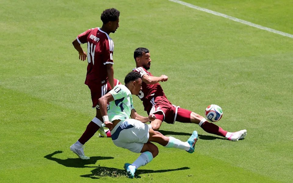 Switzerland's Dan Ndoye attempts to shoot against Qatar