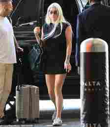 Kesha, 37, flaunted her summer style in a fashionable dress as she arrived to LAX airport on Friday to catch a flight
