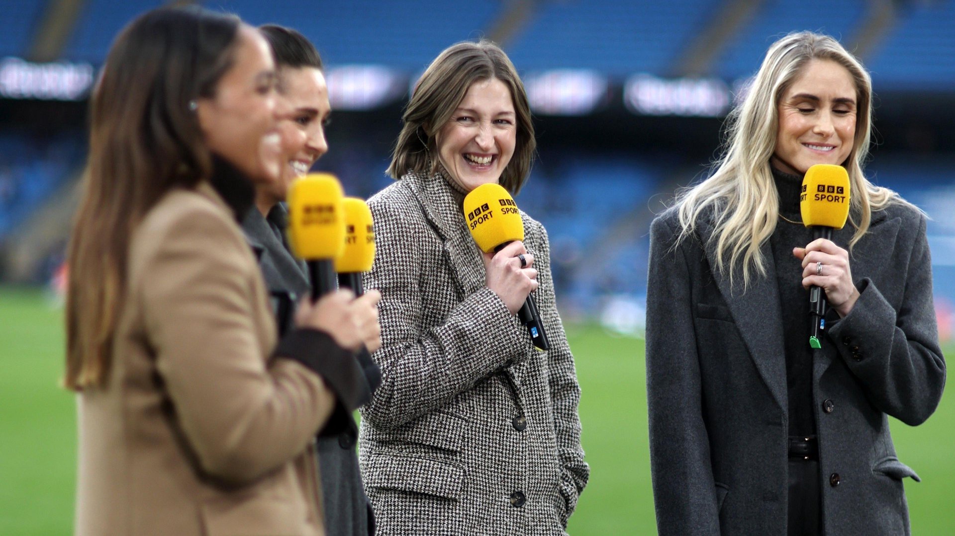 Alex Scott, Fara Williams, Ellen White and Steph Houghton holding BBC Sport microphones