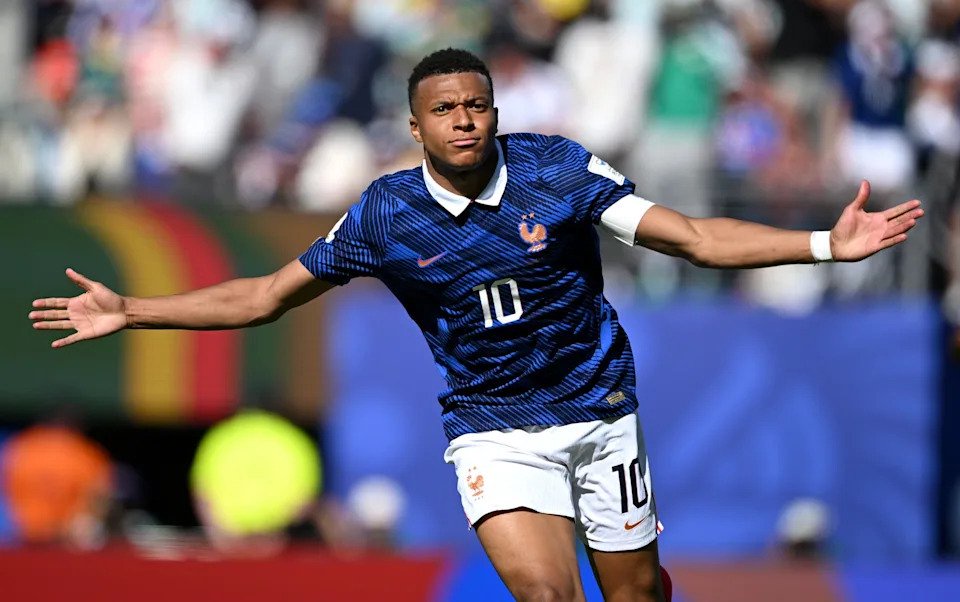 Kylian Mbappe celebrates after scoring France's second goal