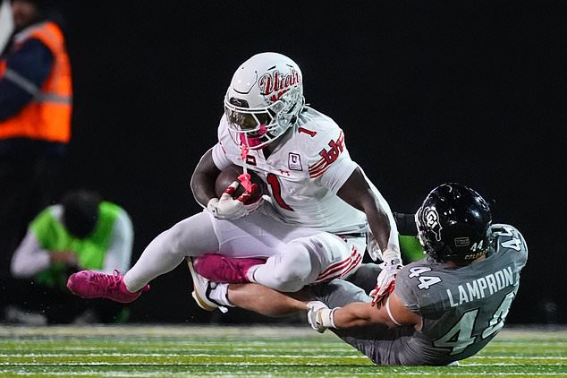 Utah running back Wayshawn Parker, left, is stopped after a short gain by Colorado linebacker Gideon Lampron in the first half of an NCAA college football game Saturday, Oct. 17 2026, in Boulder, Colo. (AP Photo/David Zalubowski)