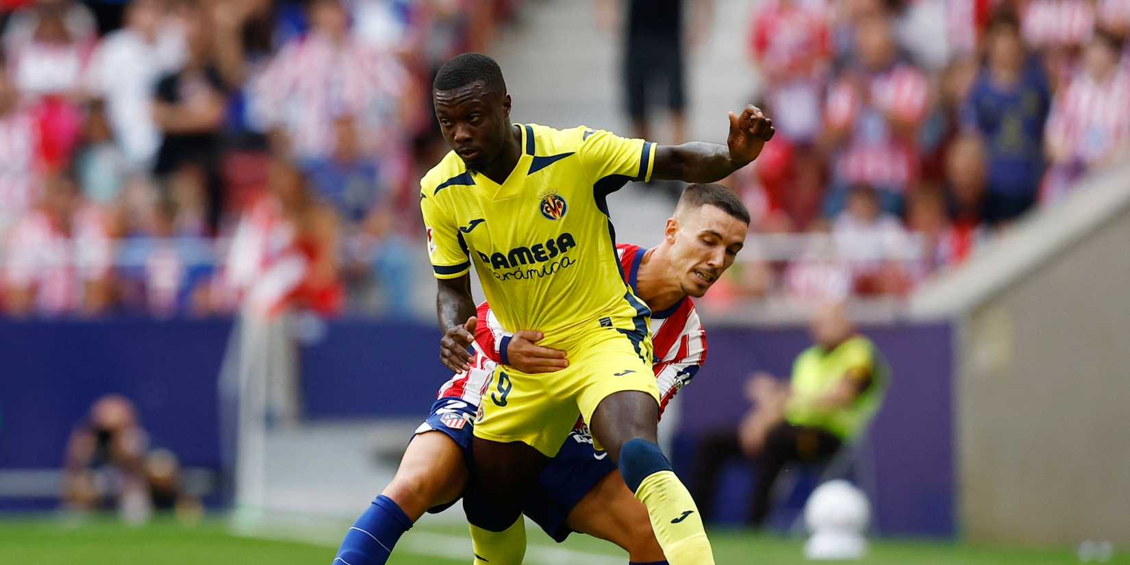 Soccer Football - LaLiga - Atletico Madrid v Villarreal - Riyadh Air Metropolitano, Madrid, Spain - August 23, 2026 Villarreal's Nicolas Pepe in action with Atletico Madrid's Alejandro Grimaldo 
