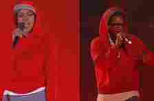 I don't know who these people are. Two individuals in red hoodies and caps performing on stage, each holding microphones