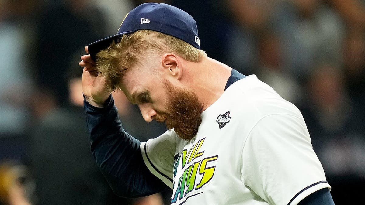 Cam Booser, Tampa Bay Rays pitcher, leaves the game during the fifth inning.