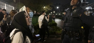 Biden keeps quiet as Gaza protesters and police clash on college campuses