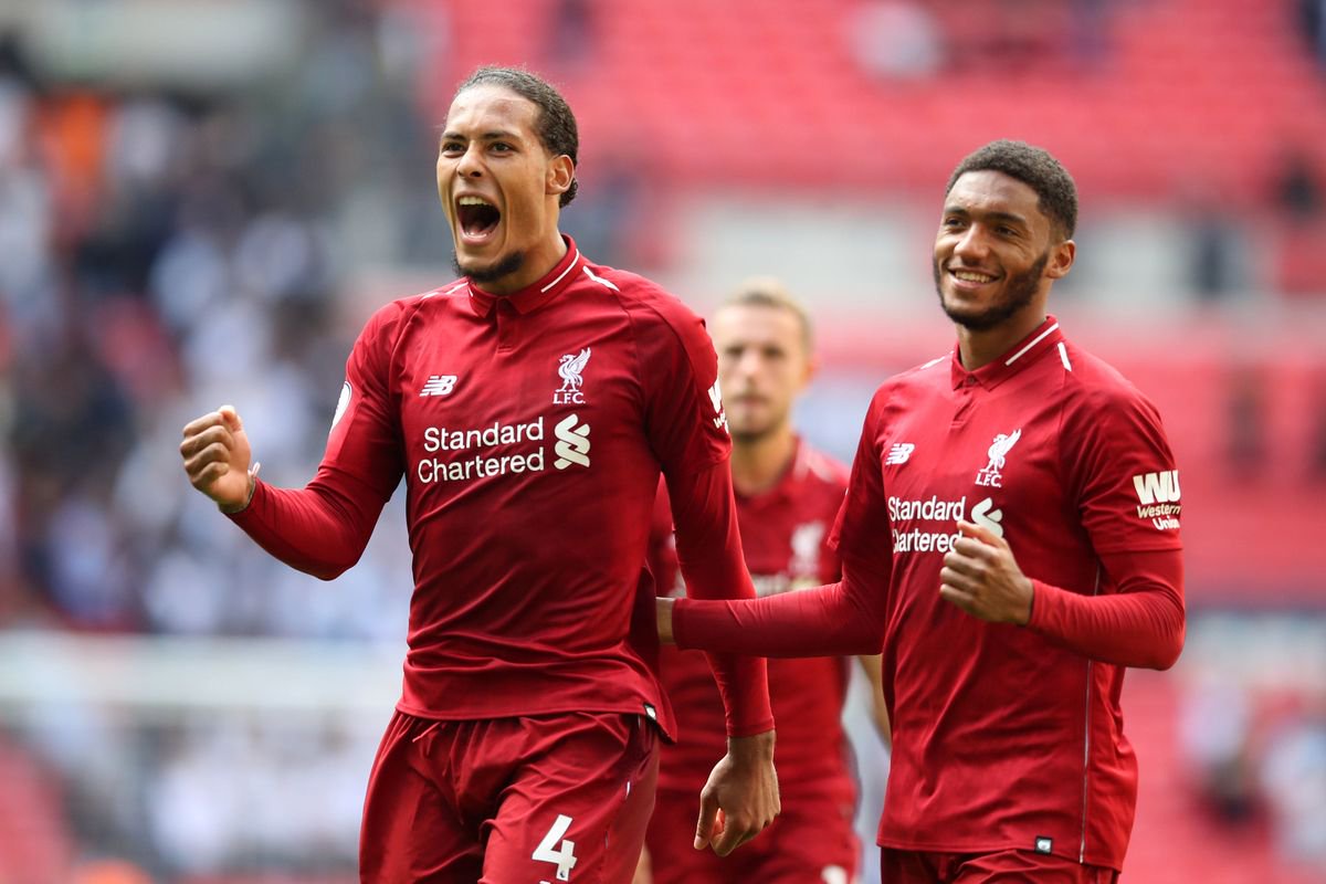 Virgil van Dijk and Joe Gomez celebrate