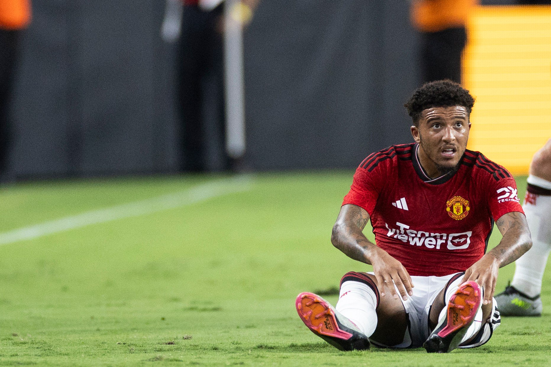 Jadon Sancho looks on during Manchester United's match against Borussia Dortmund