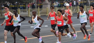 Beijing half marathon winner stripped of medal after video shows competitors allowing Chinese runner to win