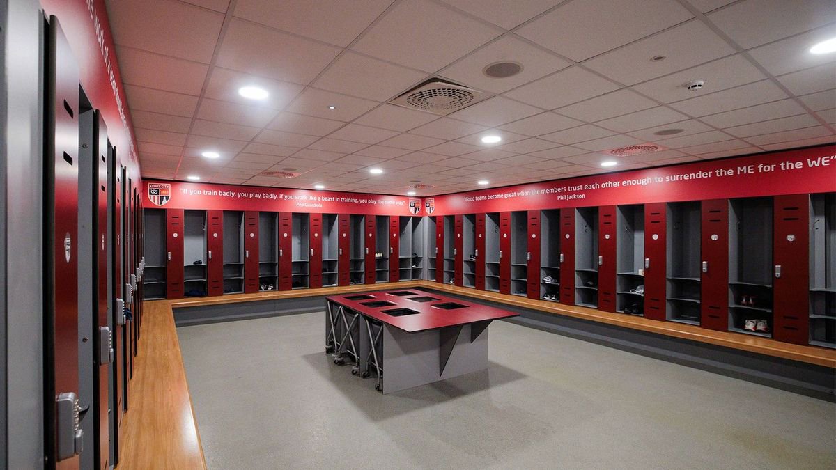 A renovated changing room for Stoke City's academy and women's teams, featuring quotes from Pep Guardiola and basketball legend Phil Jackson.