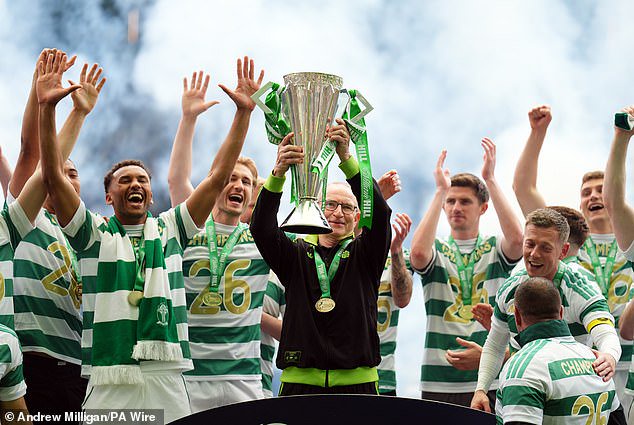 O'Neill hoists the Premiership trophy aloft after beating Hearts on the final day of last season