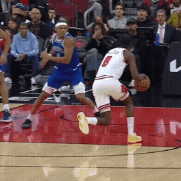Caleb Wilson rises up for a rejection and a dunk for the Bulls.