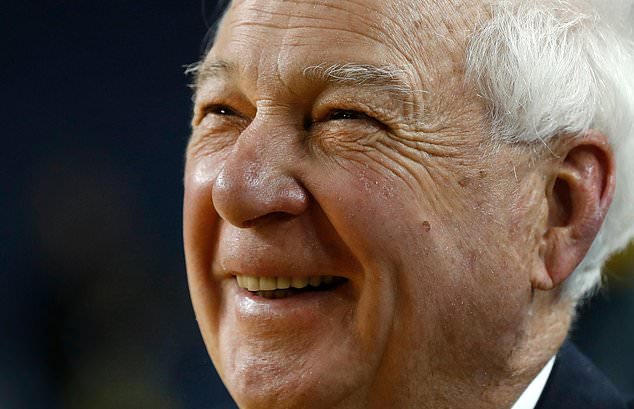 FILE - Bill Raftery, a CBS college basketball analyst, smiles after an NCAA basketball game between Michigan and Indiana in Ann Arbor, Mich., Dec. 11, 2017. (AP Photo/Paul Sancya, File)