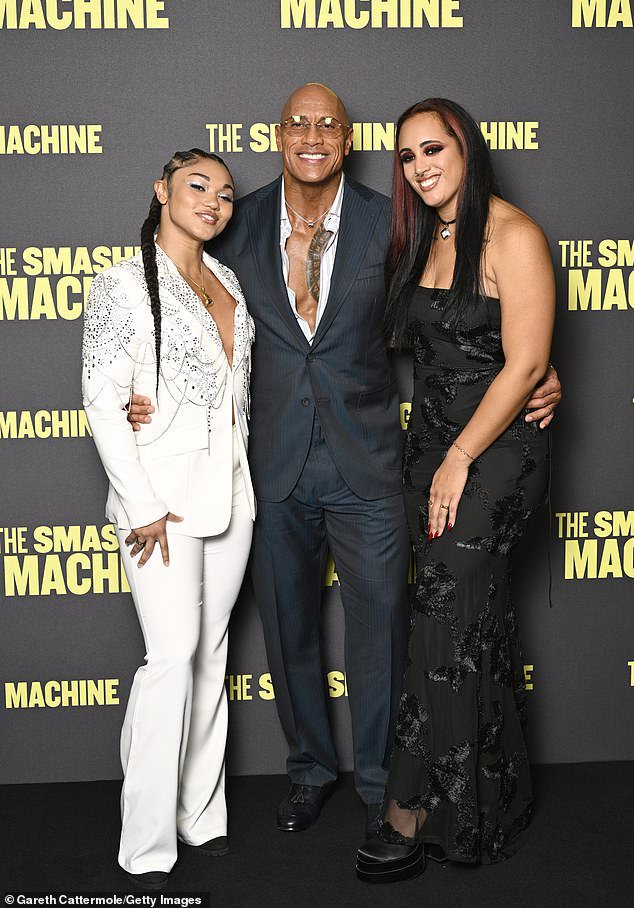 Dwayne 'The Rock' Johnson's daughter Ava has seemingly confirmed her relationship with fellow WWE star Tatyanna Dumas, after both posed with Dwayne at the London premiere of his film The Smashing Machine in September (pictured)