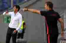 AS Roma's Portuguese head coach Paulo Fonseca (L) and Sevilla's Spanish coach Julen Lopetegui gesture during the UEFA Europa League round of 16 foo...