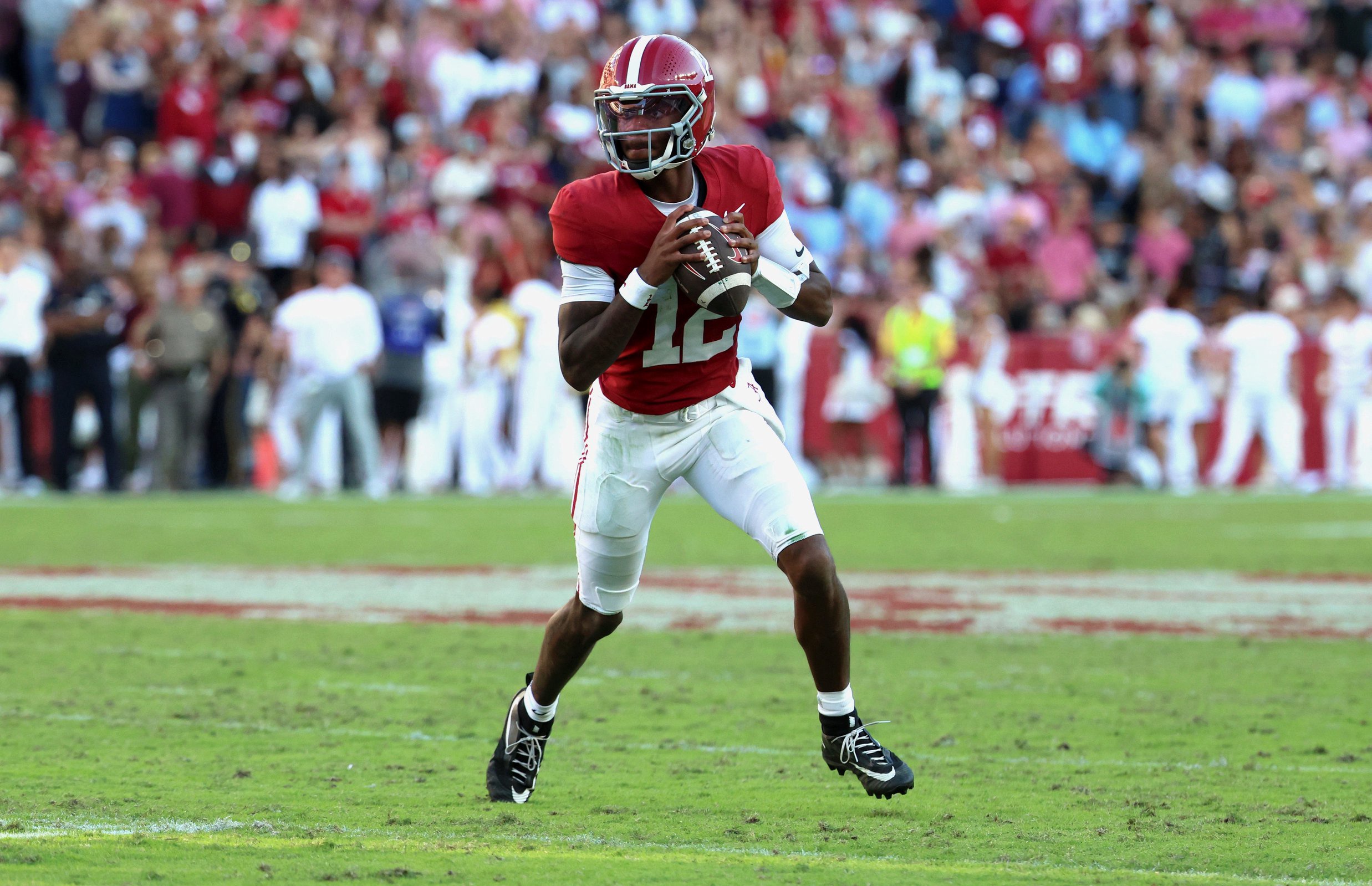 Oct 24, 2026; Tuscaloosa, Alabama, USA;  Alabama Crimson Tide quarterback Keelon Russell (12) surveys the field against the Texas A&amp;M Aggies during the second half at Saban Field at Bryant-Denny Stadium.  Mandatory Credit: David Leong-Imagn Images