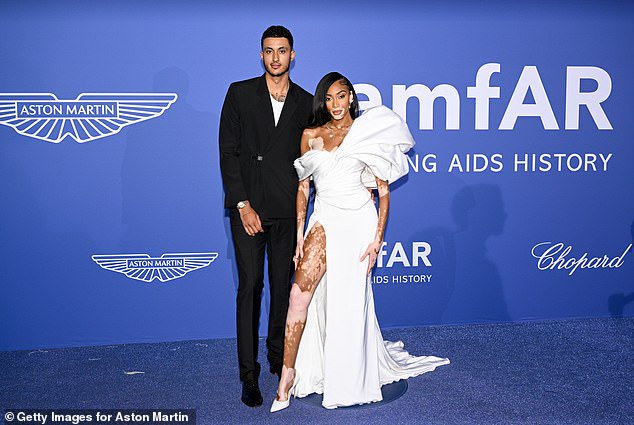 Tense moment: A source claimed McHenry intervened after overhearing fans making disparaging remarks about Winnie Harlow, who has vertigo, the fiancée of Bucks star Kyle Kuzma