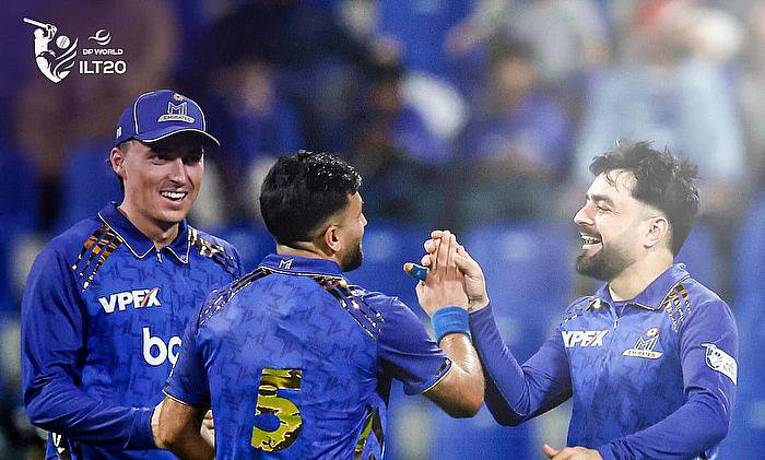 MI Emirates players celebrate a wicket