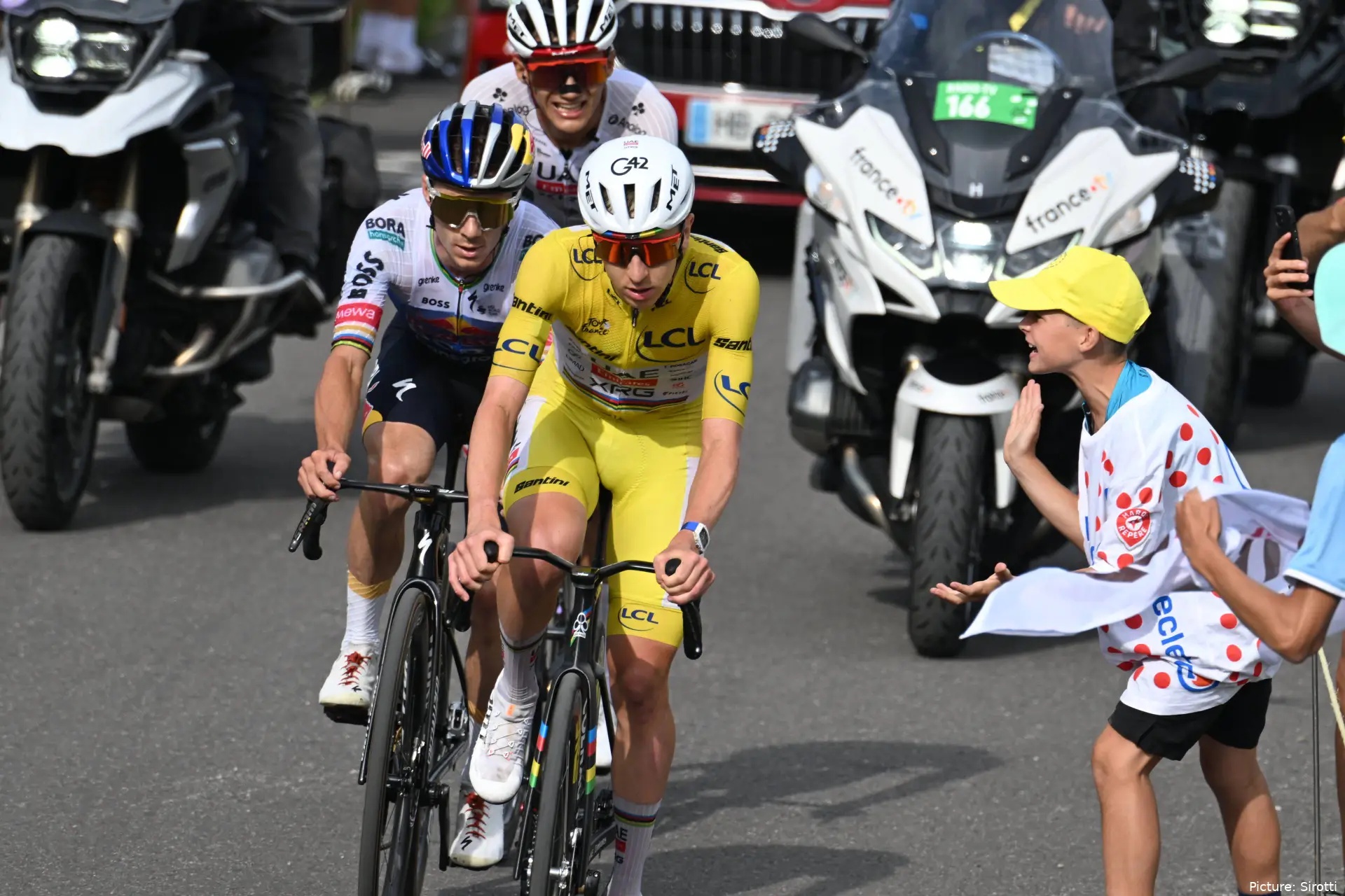 Remco Evenepoel climbing with Tadej Pogacar at the Tour de France