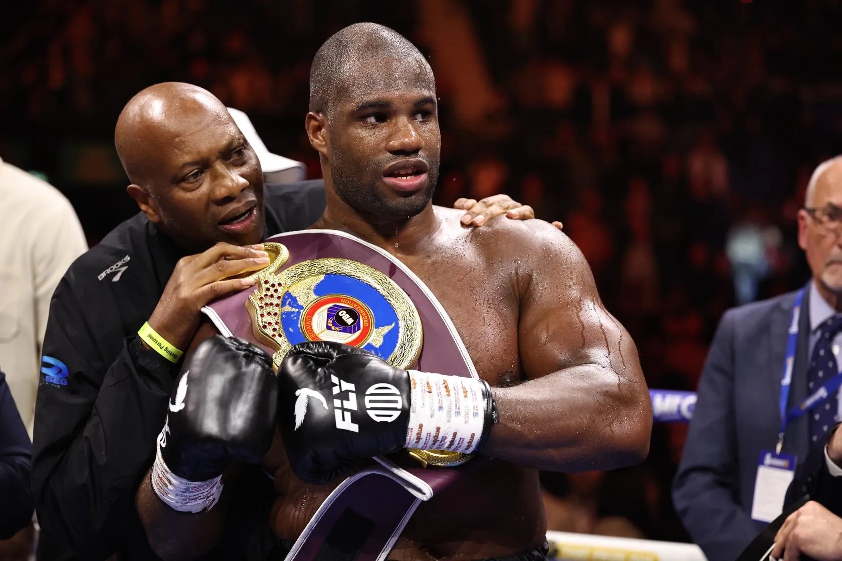 Daniel Dubois, with his father, clutches the IBF heavyweight title after beating Fabio Wardley in London on October 17, 2026