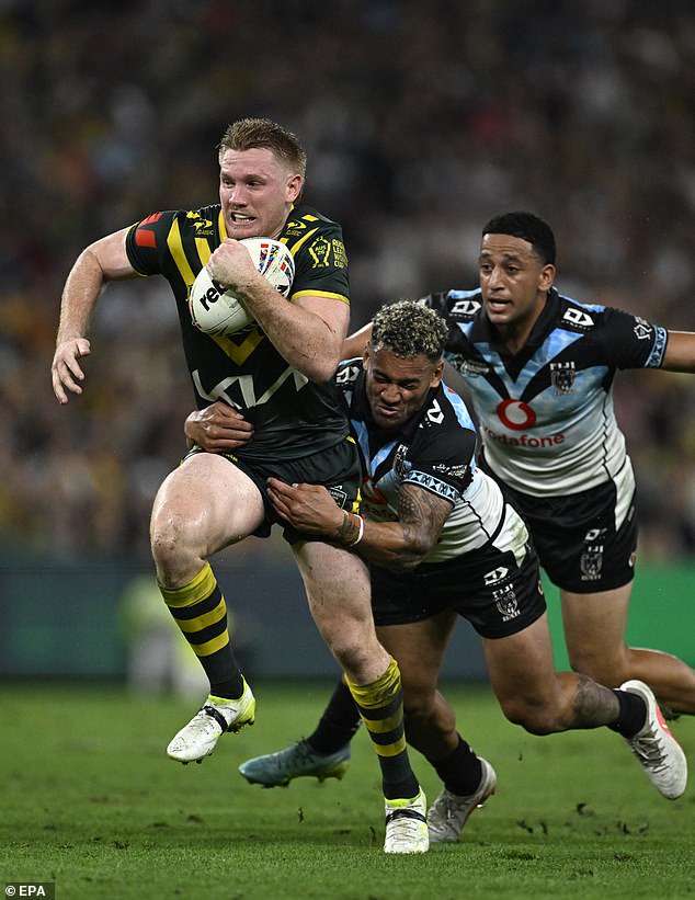 The new dad is competing with Sam Walker for a starting halves spot alongside Cameron Munster in Australia’s World Cup side