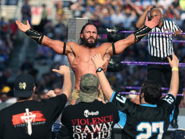 Adrian Neville aka Benjamin'PAC' Satterleycelebrates with fans during WrestleMania 33 on Sunday, April 2, 2017 at Camping World Stadium in Orlando, Fla. (Stephen M. Dowell/Orlando Sentinel/Tribune News Service via Getty Images)