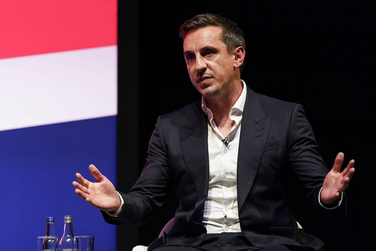 Former England football player Gary Neville speaks with Labour leader Sir Keir Starmer on day two of the Labour Party Conference at the ACC