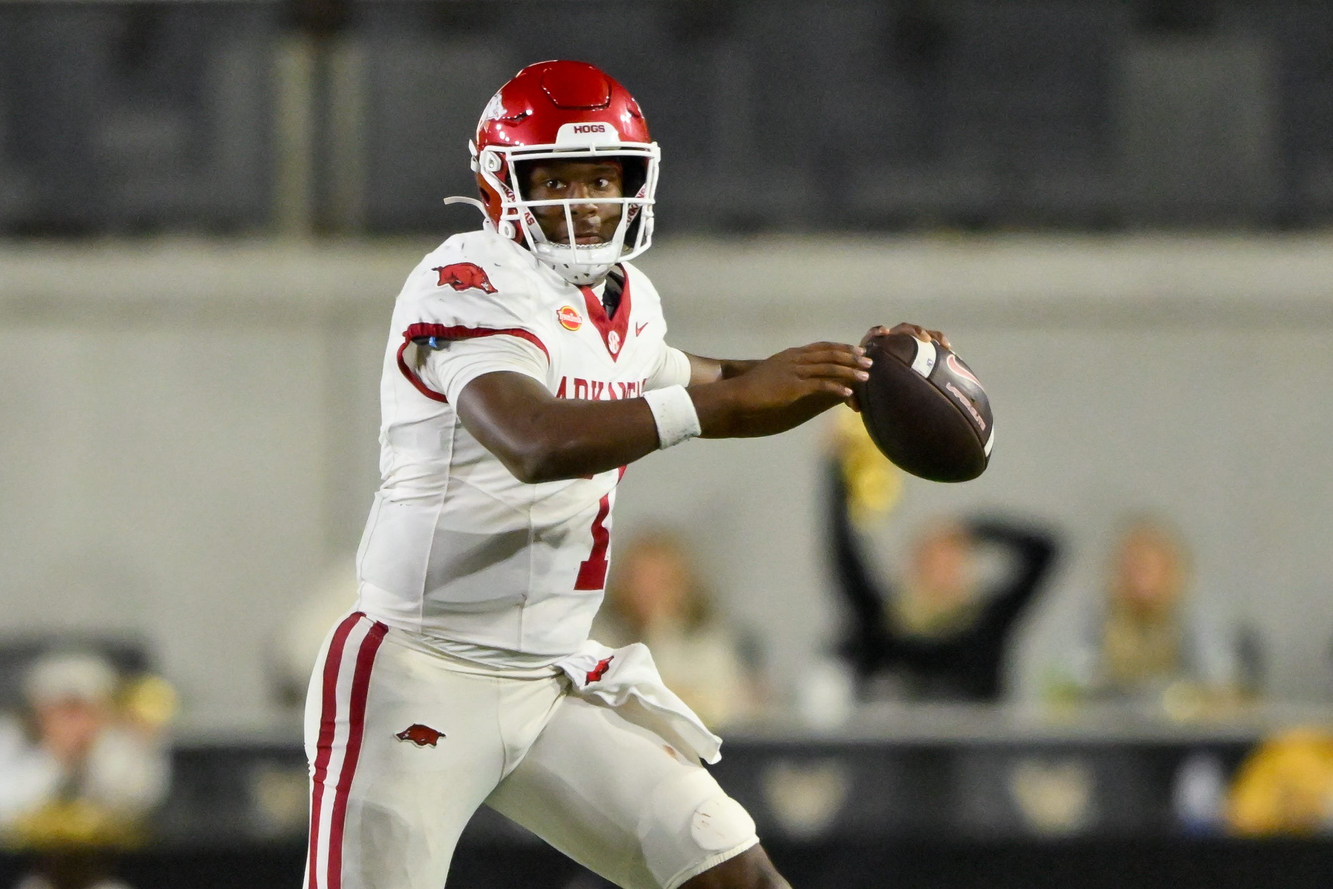 Oct 17, 2026; Nashville, Tennessee, USA;  Arkansas Razorbacks quarterback KJ Jackson (7) scrambles against the Arkansas Razorbacks during the second half at FirstBank Stadium. Mandatory Credit: Steve Roberts-Imagn Images