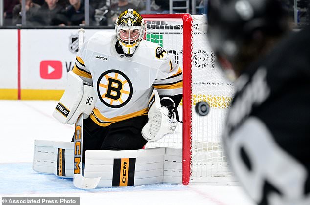 Boston Bruins goaltender Jeremy Swayman (1) makes a save against the Los Angeles Kings during the second period of an NHL hockey game Saturday, Oct. 17, 2026, in Los Angeles. (AP Photo/Wally Skalij)