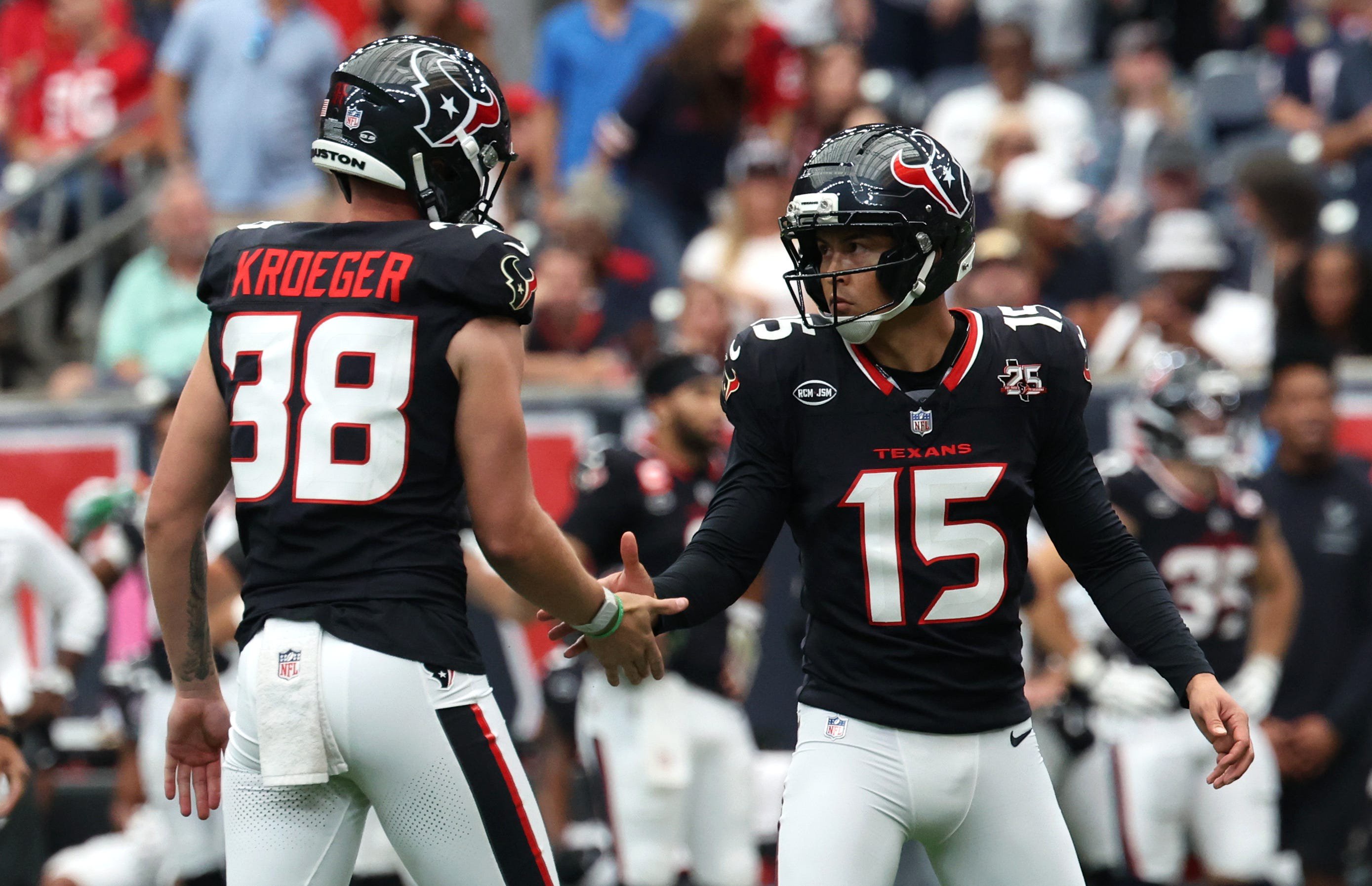 Sep 20, 2026; Houston, Texas, USA;  Houston Texans kicker Ka'imi Fairbairn (15) celebrates with punter Kai Kroeger (38) after making a field goal during the second quarter against the Cincinnati Bengals at Reliant Stadium.  Mandatory Credit: Thomas Shea-Imagn Images