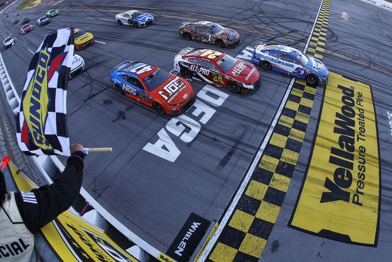 Kyle Larson (#5) takes the checkered flag to win the NASCAR Cup Series YellaWood 500 on Oct. 25, 2026.Credit: Sean Gardner/Getty