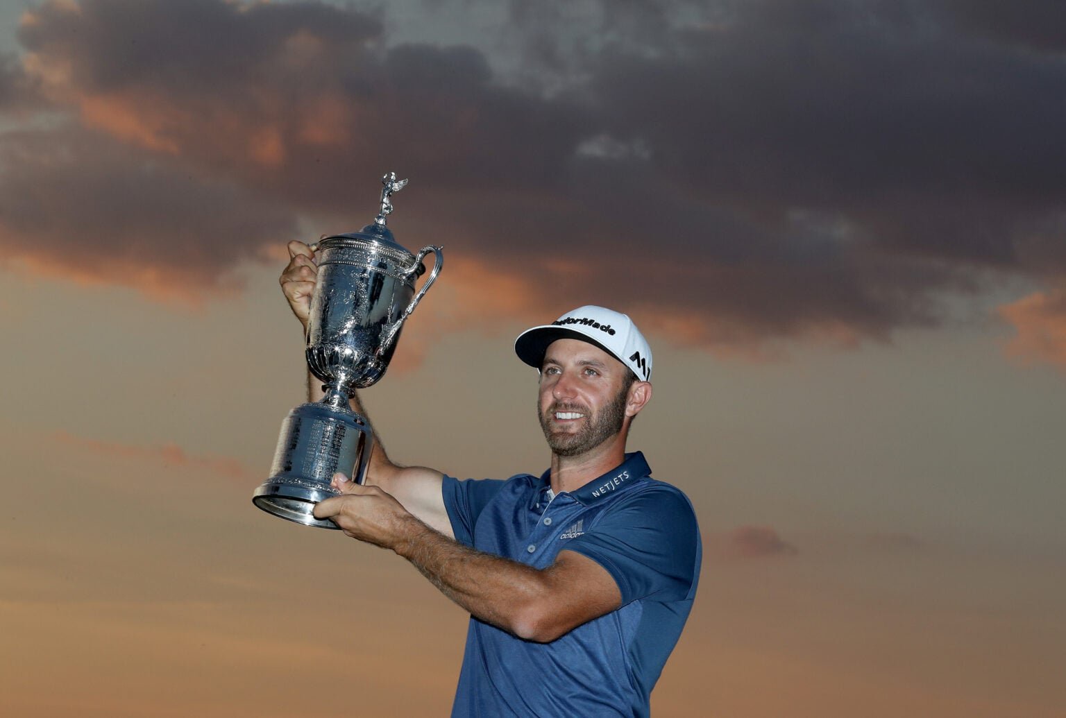 Dustin Johnson holds the trophy after the final round of the 2016 U.S.Open at Oakmont