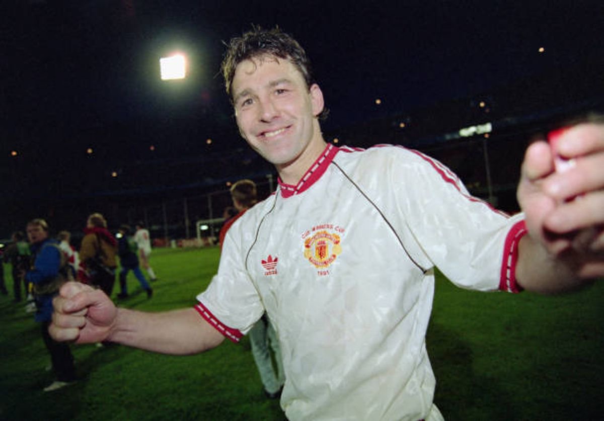Manchester United captain Bryan Robson celebrates after the 1991 UEFA European Cup Winners Cup Final between Manchester United and Barcelona on May 15th, 1991 in Rotterdam, Holland.