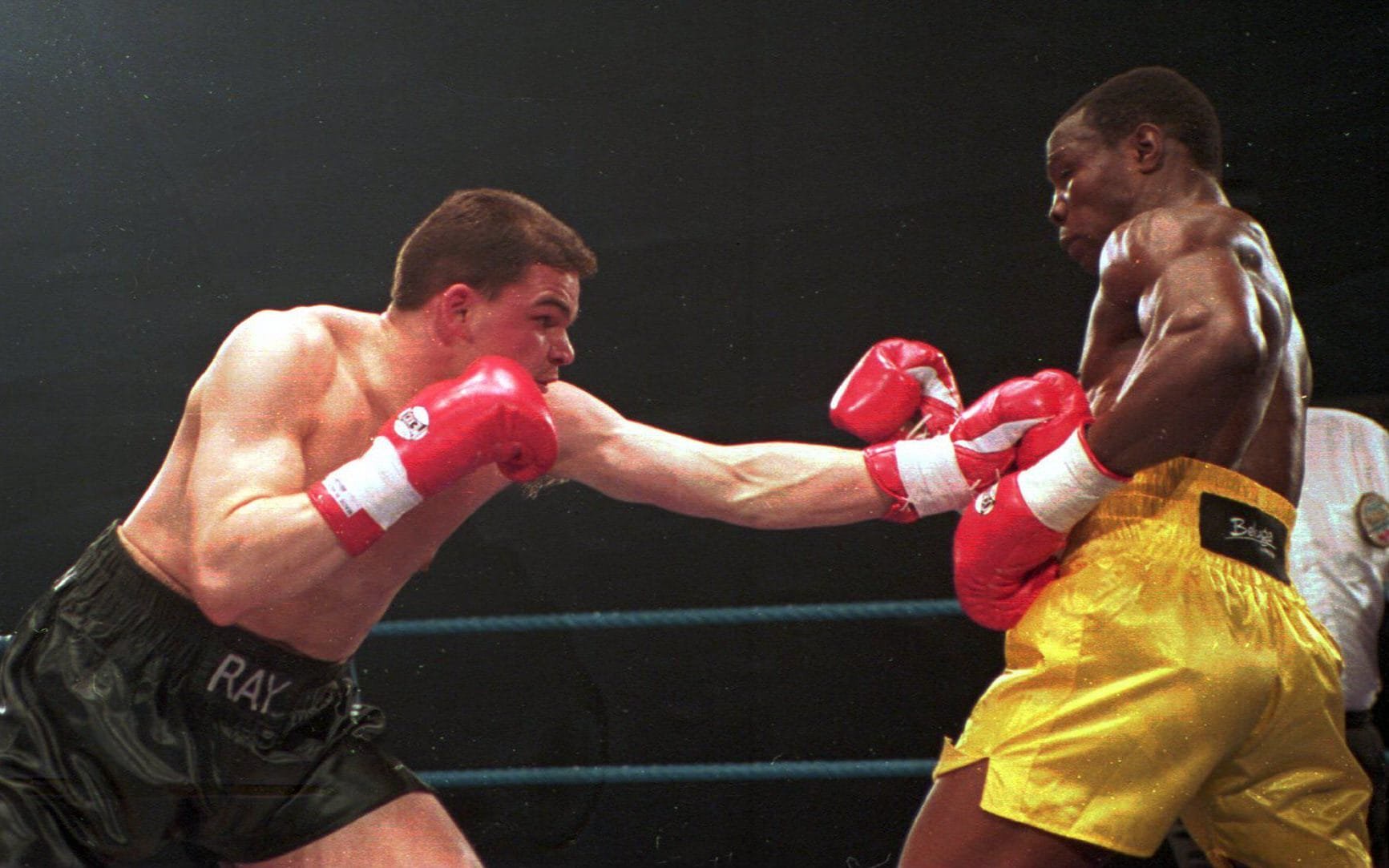 Close lands a body blow on Chris Eubank during their fight in Belfast