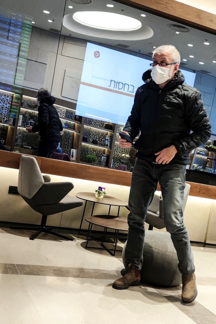 Roman Abramovich stands in a VIP lounge before a jet linked to him took off for Istanbul from Ben Gurion international airport in Lod near Tel Aviv